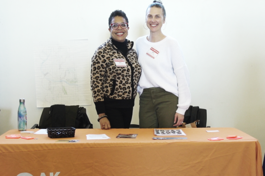 Two of our Find YOUR Path partners at a table, ready for students to visit